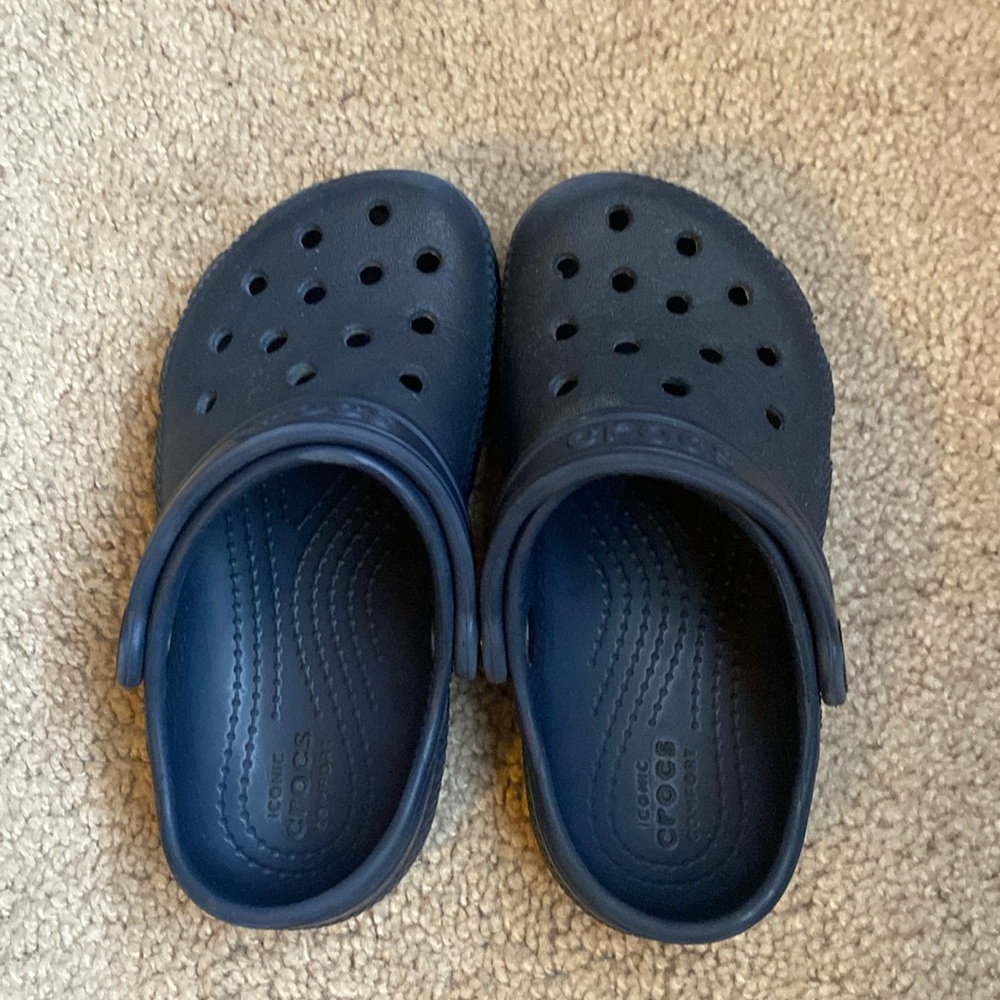 Children’s size 9 navy blue crocs.